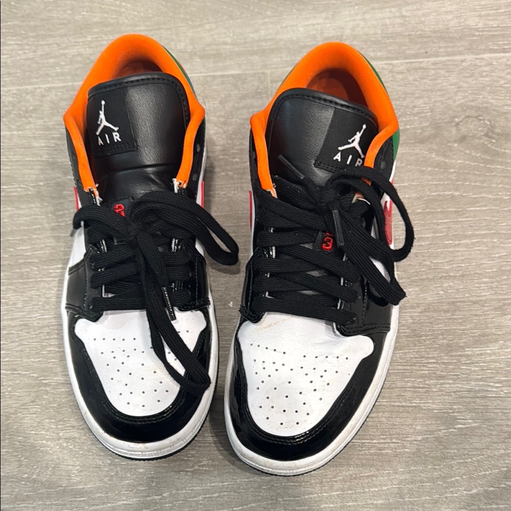 Air Jordan Black and White Sneakers with Orange Accents